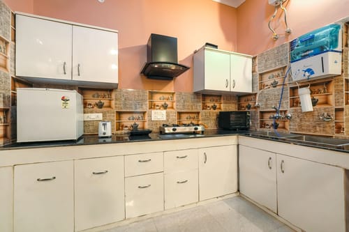 Riva Dreams | 2-BHK Retreat with Hill Views & Lush Garden