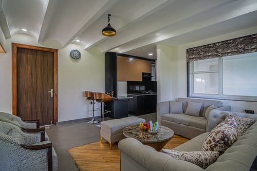 Trio’s Top | Hilltop Pet-friendly 2-BHK with Shared Sit-out Area, Stepped Garden & Hill Views