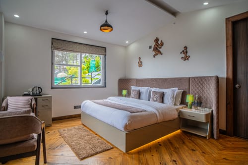 Trio’s Top | Pet-friendly 2-BHK with Attic, Shared Sit-out Area, Stepped Garden & Hill Views