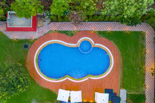 Sanisa Farm |  3-BHK Farmhouse With Private Pool, Game Zone & Lush Garden