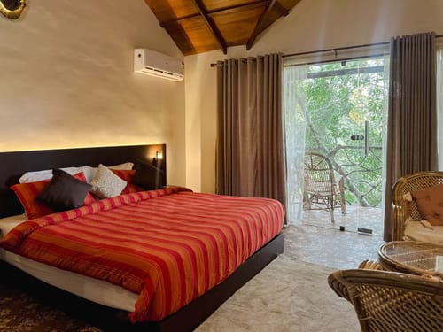 Panchavadi | Forest-Facing Room on 10-acre Land, Shared Natural Pool, Garden & Restro