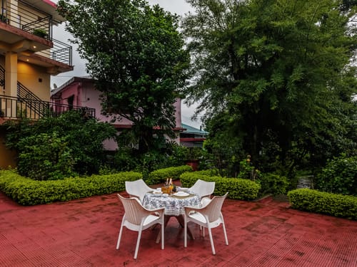Riva Dreams | 2-BHK Retreat with Hill Views & Lush Garden