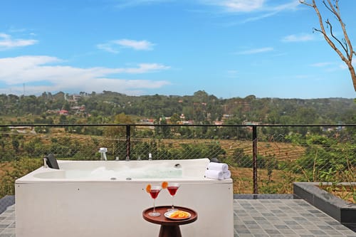 Esh Cottages Moss | Hilltop 2-BHK Retreat with Open-air Jacuzzi, Shared Garden, Pool & Cosy Lounge