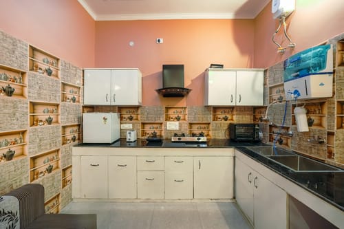 Riva Dreams | 2-BHK Retreat with Hill Views & Lush Garden