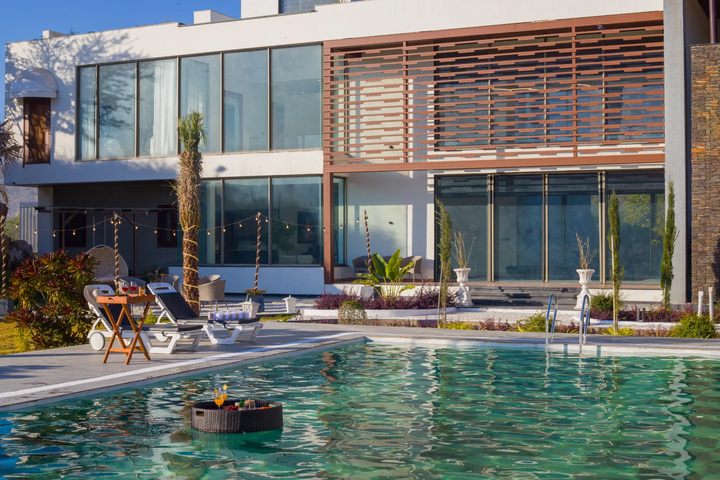 Kvanya Mansion | Regal 5-BHK Getaway With Pvt Pool, Home Theater, Gym & Garden - Image 5