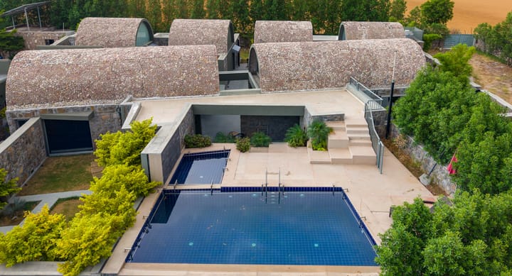 Stone Age Home | 4-BHK Stone Retreat with Private Pool, Garden, Gazebo, Terrace, & Open-Air Dining