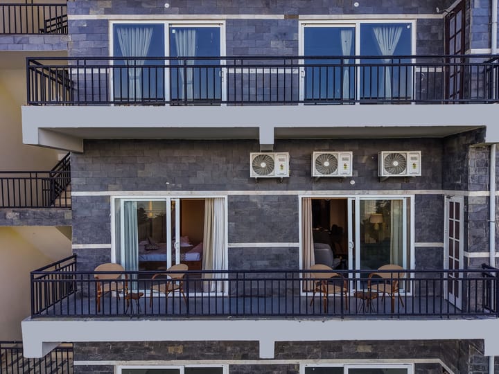Dochi  |  4-BHK apartment with Hill Views, Living Room, & Balconies