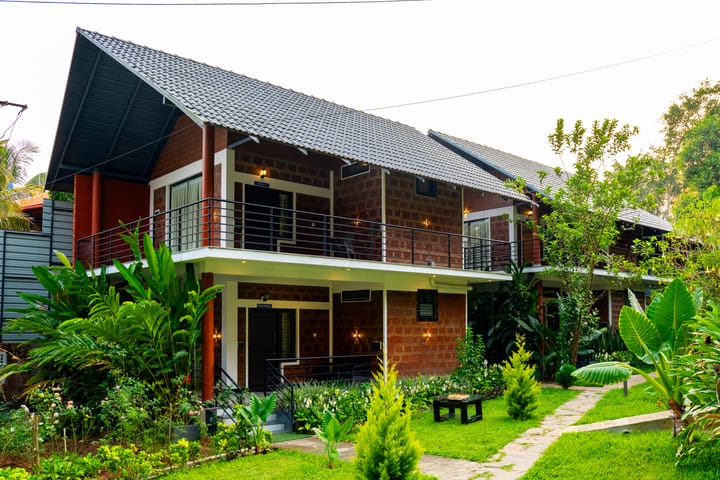 Avocado Cottages Deluxe Room | Pet-friendly Stay With Private Outdoor Seating Amid Avocado & Coffee Estate