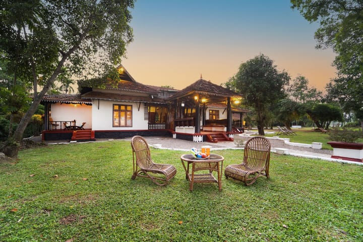 Vembanad House | Lakeside Heritage 4-Bedroom Retreat with Garden & Outdoor Sitting Area