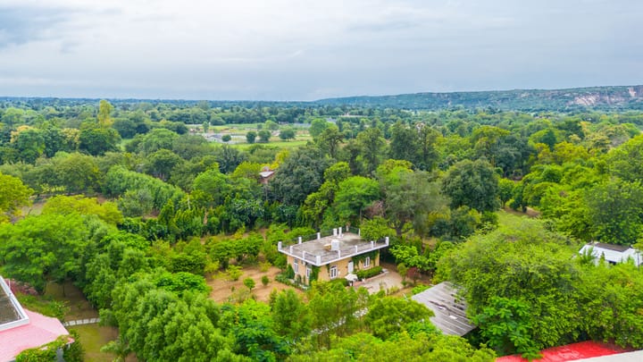 Raha Farms | 2-BHK Pet-friendly Retreat with a Garden, Shared pool, Restaurant, Library, & Game zone - Image 4