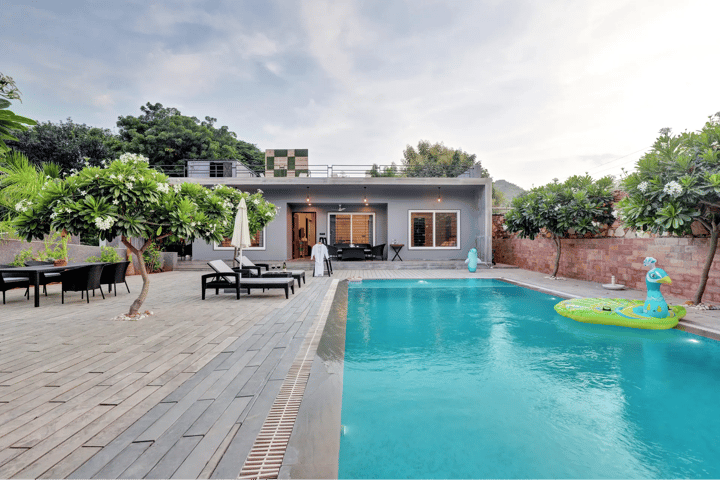 Radhyam | Charming 2–BHK Escape With Private Pool, Garden & Aravalli Hill Views - Image 5