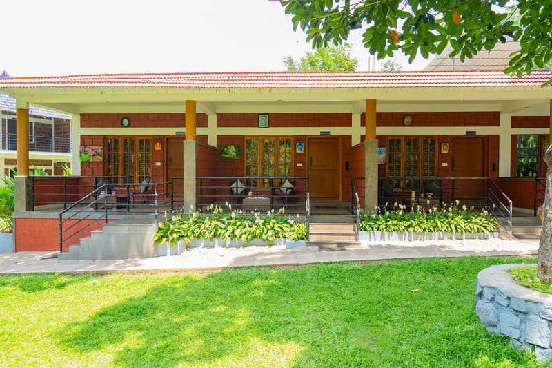 Avocado Cottages Executive Room | Pet-friendly Stay With Private Patio & Common Garden Amid Avocado & Coffee Estate Plantation – photo 1