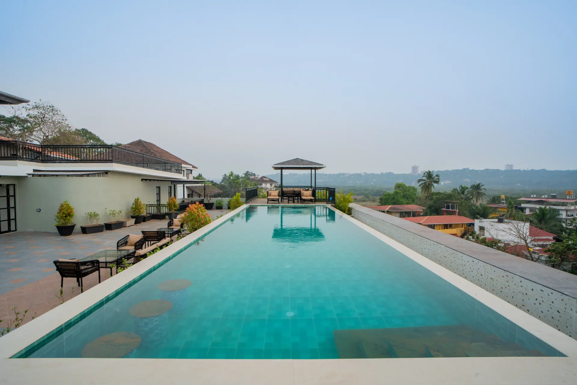 Kamerios Regalia | Elegant Pet-friendly 2-BHK Apartment With Rooftop Pool & Lift - Image 2