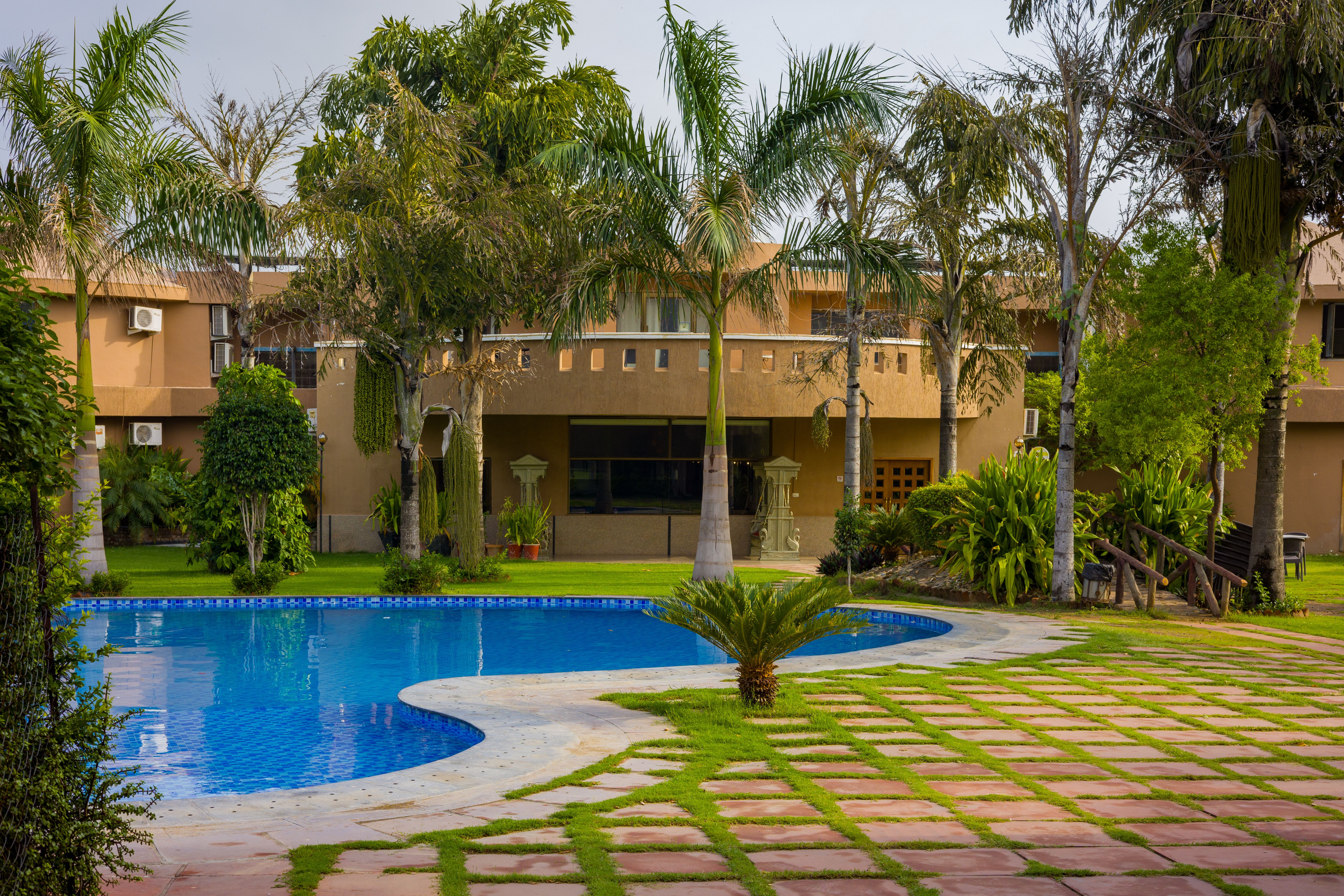 Jeevantara Jacuzzi Suite | 1-Room Retreat with Jacuzzi, Common Pool, Wedding Venue & EV Charging Station - Image 2